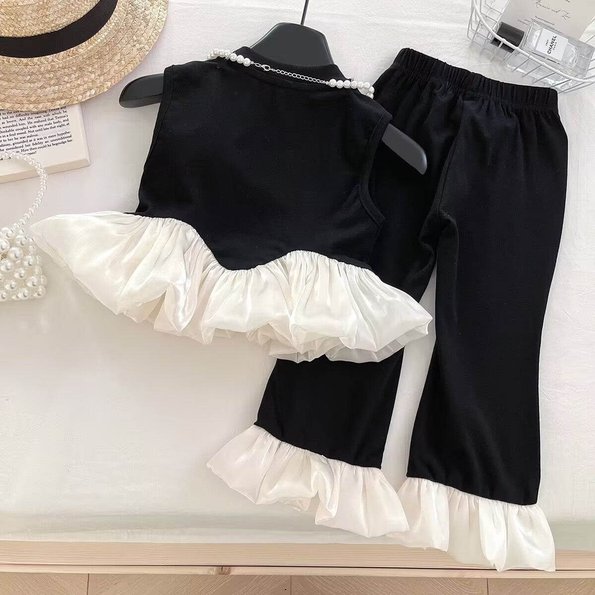 Black and White Ruffle Top and Flared Pants Set – TYM-YWL-004