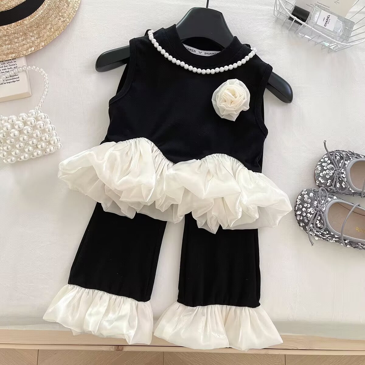 Black and White Ruffle Top and Flared Pants Set – TYM-YWL-004
