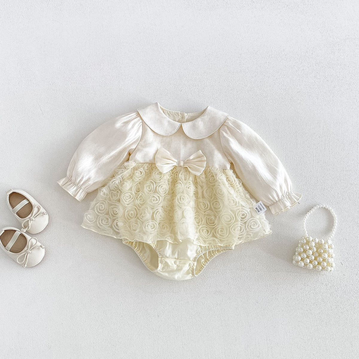 Cream Rosette Skirted Romper – TYM-FCN-016